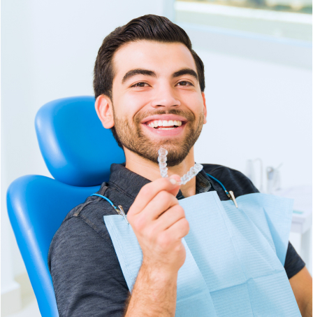 Our Patients Is Holding Clear-aligners-Austin